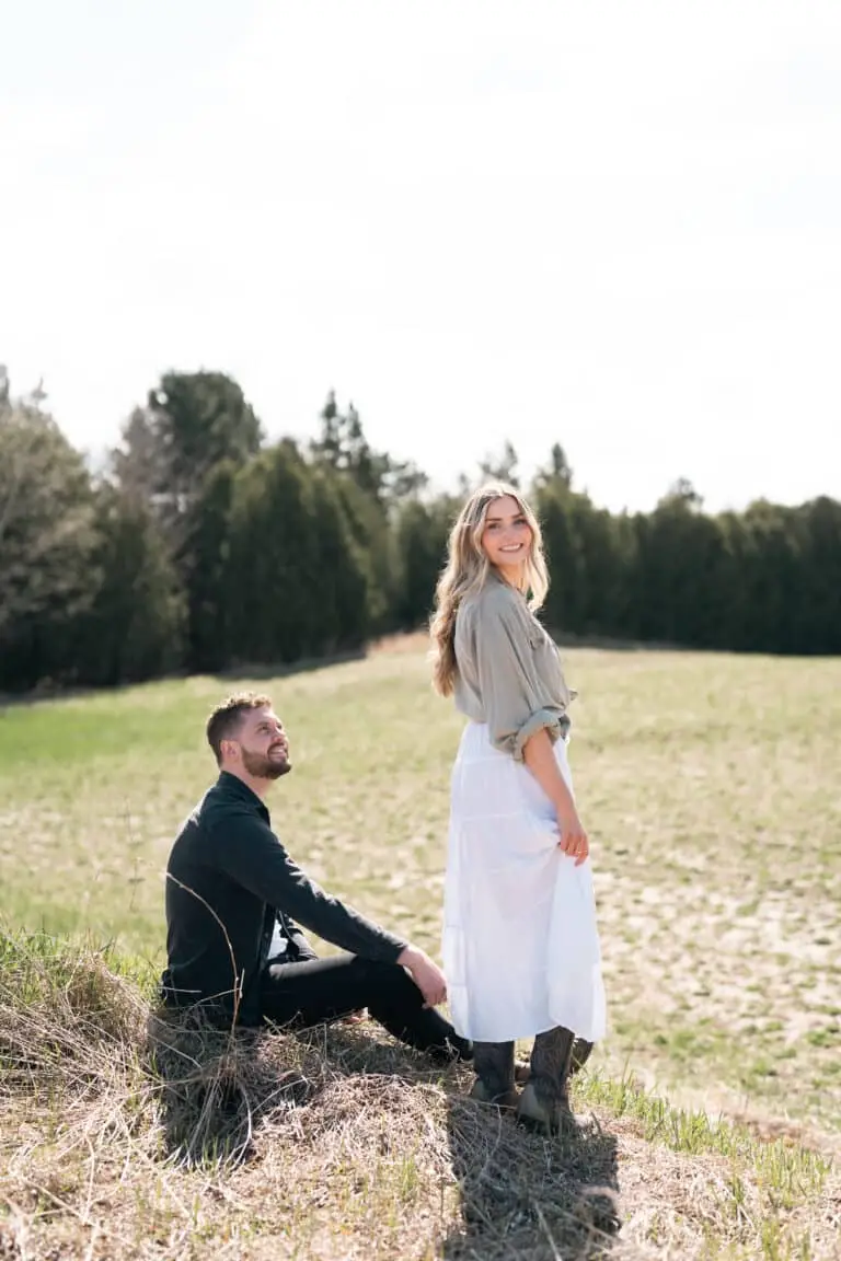 couple at farm taking engagement photos