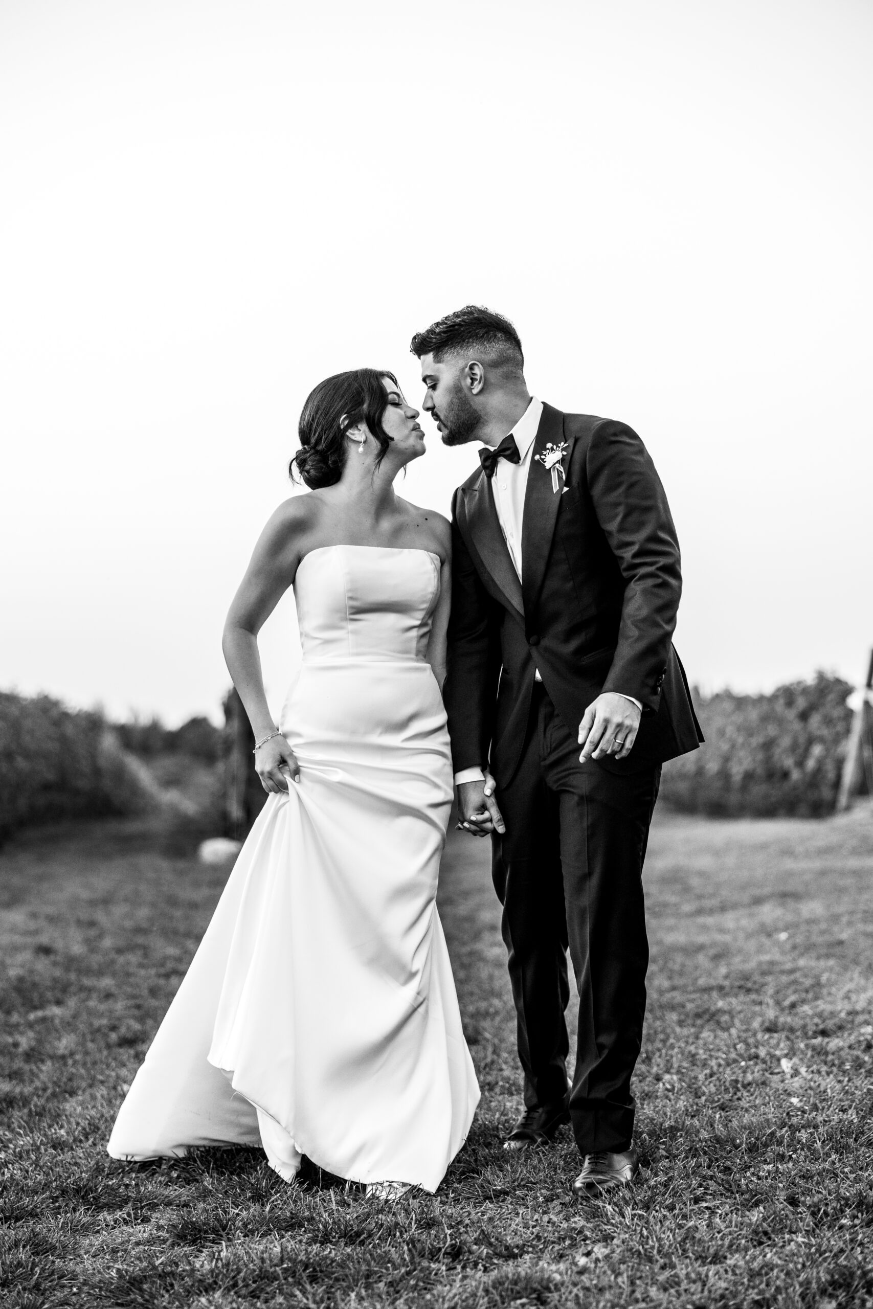 black and white photography of bride and groom