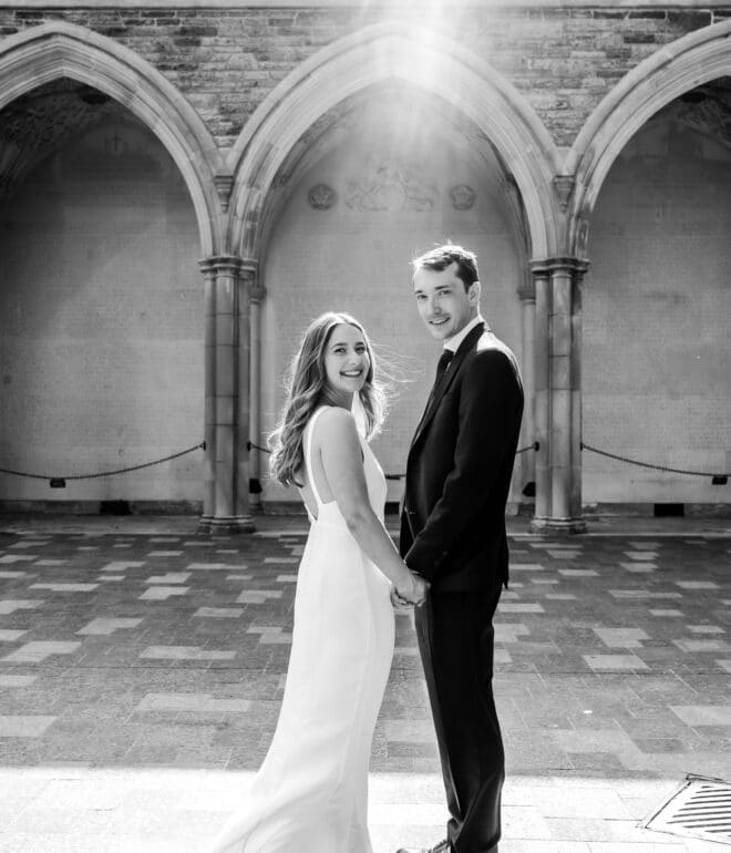 Bride and groom at holding hands documentary photography