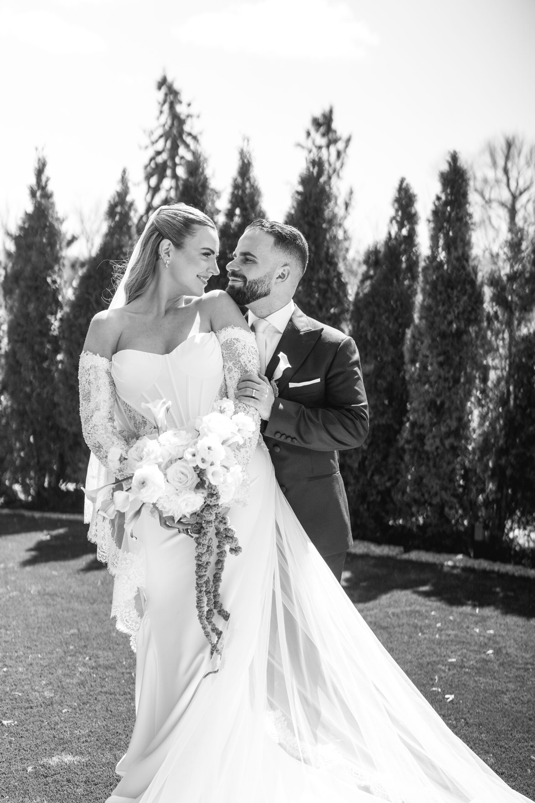 bride and groom hugging at arlington estate
