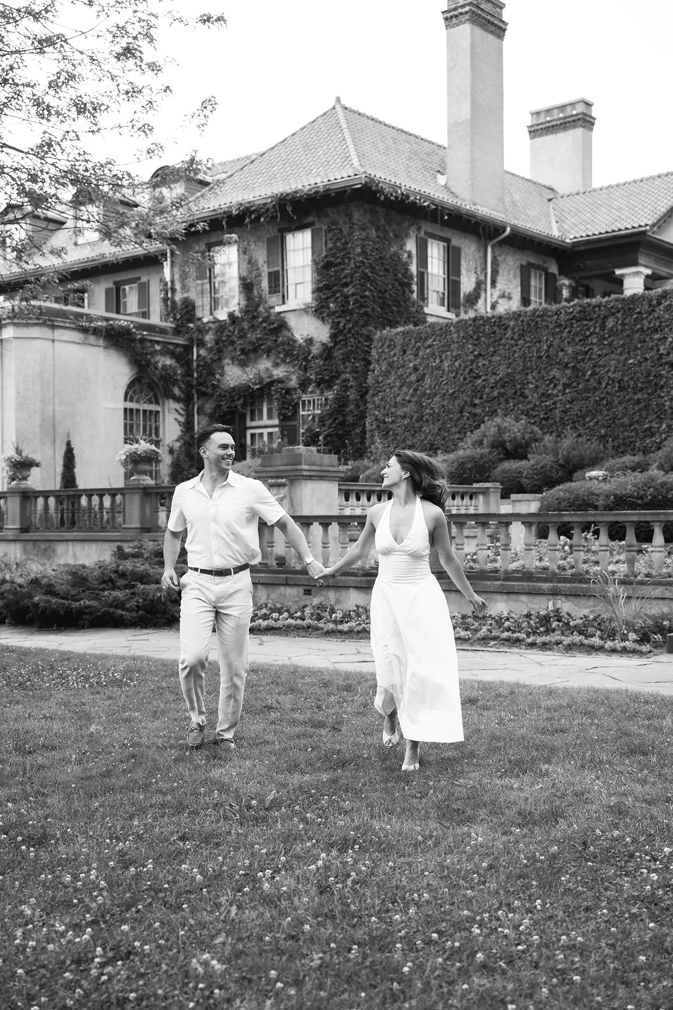 Black and white couple portrait in front of Parkwood Estate